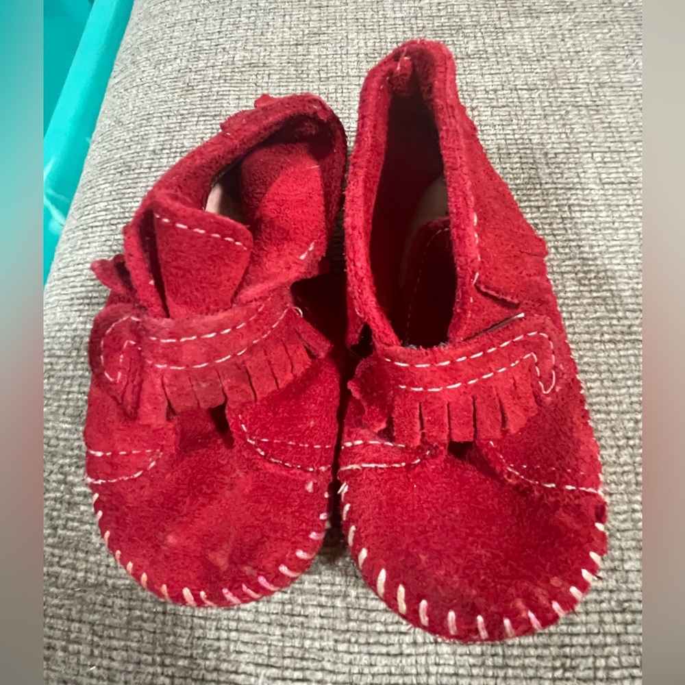 Infant Minnetonka moccasin bootie. Red with fringe. Super cute!